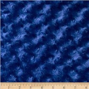 May include: Blue swirl patterned minky fabric. The fabric has a soft, fuzzy texture.