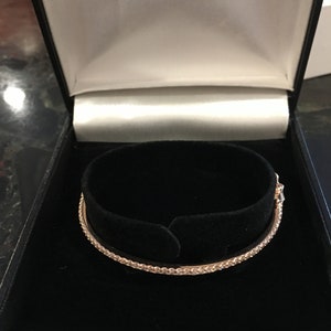 14K rose gold and diamond bangle
