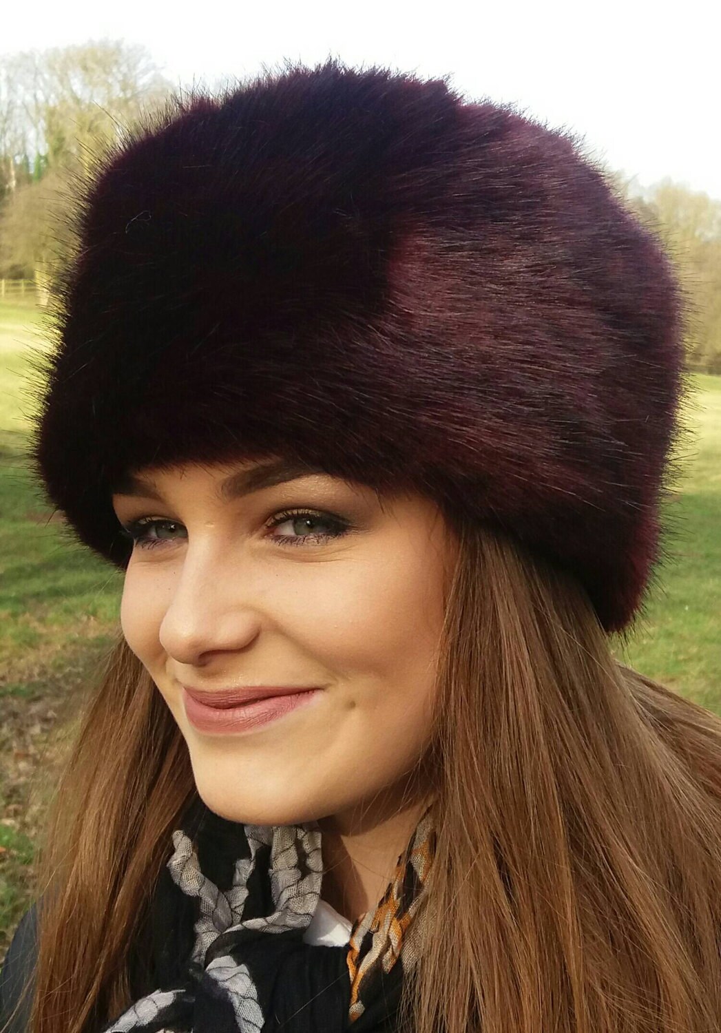 Posh Wine Faux Fur Hat with Polar Fleece Lining.