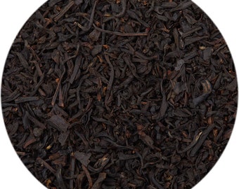 May include: Close-up of loose black tea leaves, ideal for brewing a hot cup of tea.