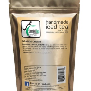 May include: A brown paper pouch with a gold zipper closure. The front of the pouch features a logo for Special Tea Company and the text "handmade iced tea" and "MADE WITH PREMIUM LOOSE LEAF TEA". The back of the pouch lists the product name "ORANGE CREAM" and brewing instructions. The text "Like us on Facebook! www.facebook.com/specialteacompany" is also included.