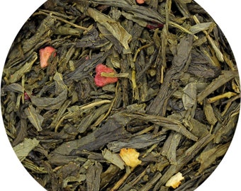 May include: Green tea leaves with dried fruit pieces, including red and orange pieces.