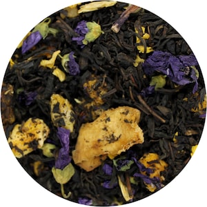 May include: A close-up of a blend of black tea leaves, dried fruit pieces, and purple flower petals. The tea blend is a mix of black tea, dried mango, and cornflower petals.