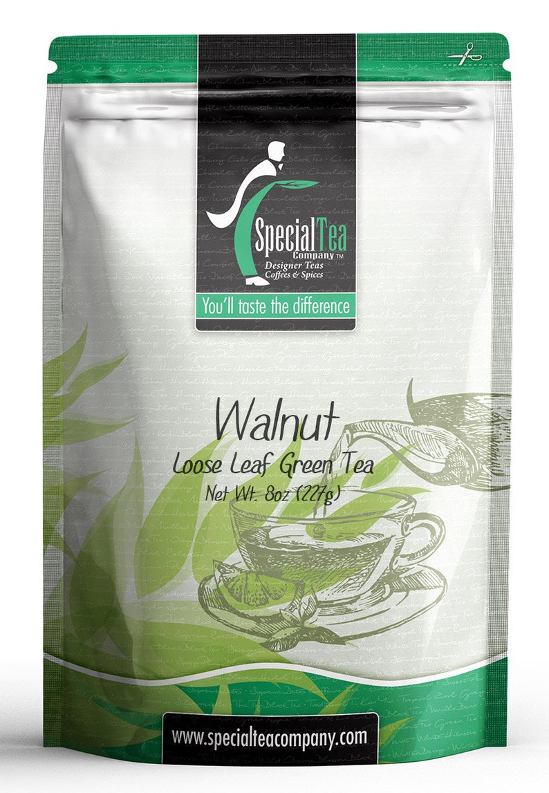 May include: A white pouch with green accents featuring a drawing of a teacup and a lemon wedge. The pouch contains 8 ounces (227 grams) of Walnut Loose Leaf Green Tea from Special Tea Company. The text "You'll taste the difference" is printed on the pouch.