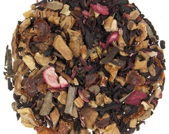 May include: A close-up of a blend of dried fruit, herbs, and spices for making tea. The mix includes red and orange fruit pieces, brown sticks, and dark purple flower petals.