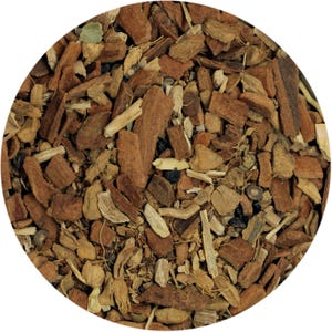 May include: Close-up of a circular arrangement of dried herbs and spices. The image features a mix of brown, tan, and green pieces, including what appears to be bark, roots, and leaves. The texture is rough and natural, suggesting a blend for culinary or medicinal use.