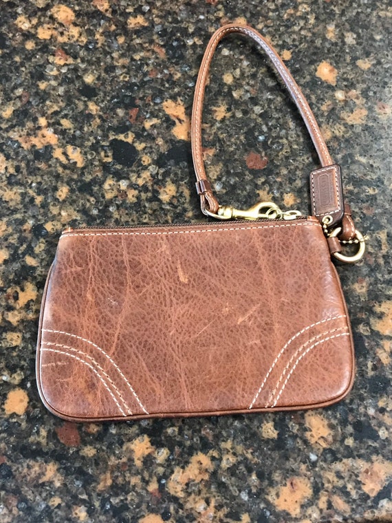 Super cute brown  leather coach wristlet