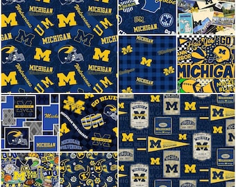 May include: A collage of fabric patterns featuring the University of Michigan's colors and logos. Designs include the block M, helmets, and the words "Michigan" and "Wolverines". The color scheme is primarily maize and blue.