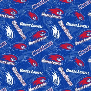 May include: A blue fabric pattern featuring the UMass Lowell logo, which consists of a stylized red and white hawk head mascot, repeated alongside the text UMass Lowell in white lettering with a blue outline, set against a textured blue background.