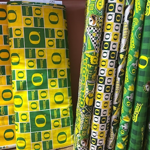 NCAA University of Oregon Ducks Green & Yellow College Logo Cotton Fabric by Sykel! 7 Styles