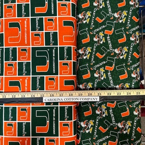 NCAA University of Miami Hurricanes Green & Orange College Logo 100% Cotton Fabric! 2 Styles