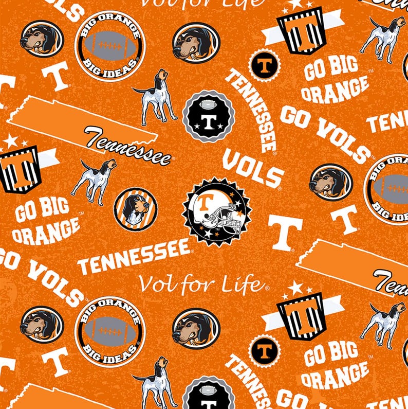 May include: Orange fabric with a repeating pattern of Tennessee Volunteers imagery. The design includes the words "Tennessee", "Go Big Orange", "Vols", and "Vol for Life", along with football helmets, hound dogs, and the letter "T".