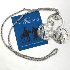 Vintage LUNT STERLING MEDALLION First Christmas 1975 in Sterling Silver Pendant Ornament Keepsake