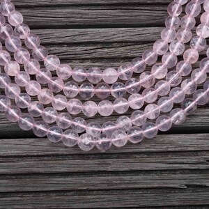 Rose Quartz (Madagascar) 10-11mm round beads (ETB00464)