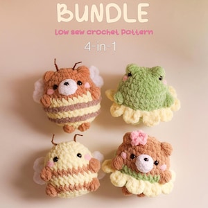 May include: A bundle of four crocheted amigurumi toys: a bee, a frog, and two bears. The bee is brown and yellow, the frog is green, and the bears are brown. The toys are handmade and have a soft, plush appearance. The text "BUNDLE" and "4-in-1" is visible.