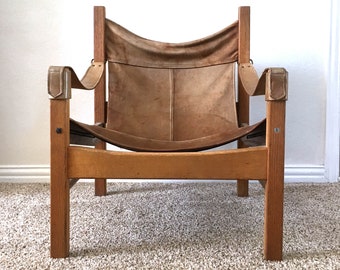 vintage leather chair chesterfield mid century sling chair vintage leather wood safari club distressed living room furniture chair etsy vintage leather chair chesterfield mid century sling chair vintage leather wood safari club distressed living room furniture chair etsy