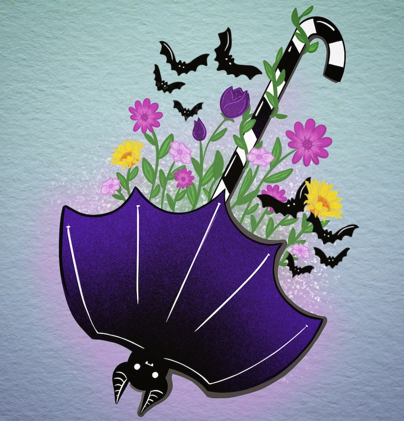 May include: A purple bat-shaped umbrella with a candy cane handle and a floral arrangement inside. The flowers are pink, yellow, and purple. There are black bats flying around the umbrella.