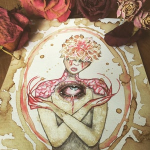 May include: Watercolour painting of a person with a large eye in the centre of their chest. The person has a flower crown on their head and their arms are crossed in front of them. The background is a light brown with brown splotches.