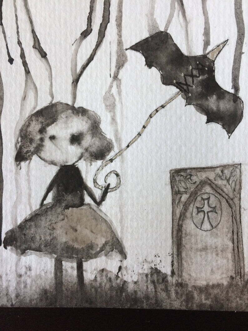 May include: A black and white watercolor painting of a girl holding a bat-shaped umbrella in a forest setting. The girl is wearing a dress and has a large head. The bat umbrella has a stitched pattern on it. There is a stone archway in the background.