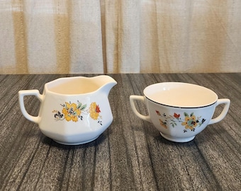 Vintage 1932 Homer Laughlin Yellowstone Medieval Rose creamer and sugar.