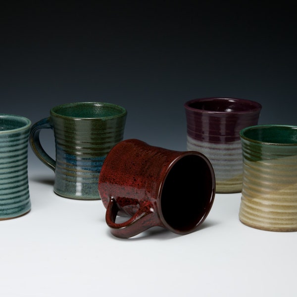 Wheel-thrown pottery mugs curved