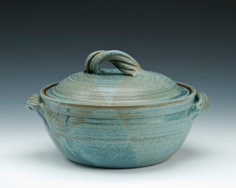 Lidded Pottery Casserole Dish with twisted strap handle