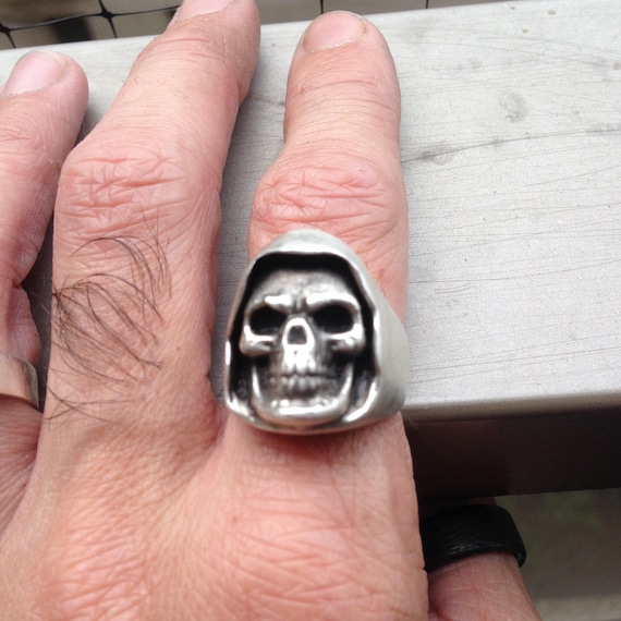 Grim Reaper With Sickle Black Impressed Skull and Hatchet