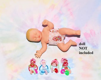 Set of 4 toys for mini baby - doll NOT included