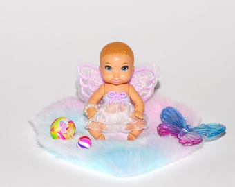 3 inch baby with plush rug and accessories