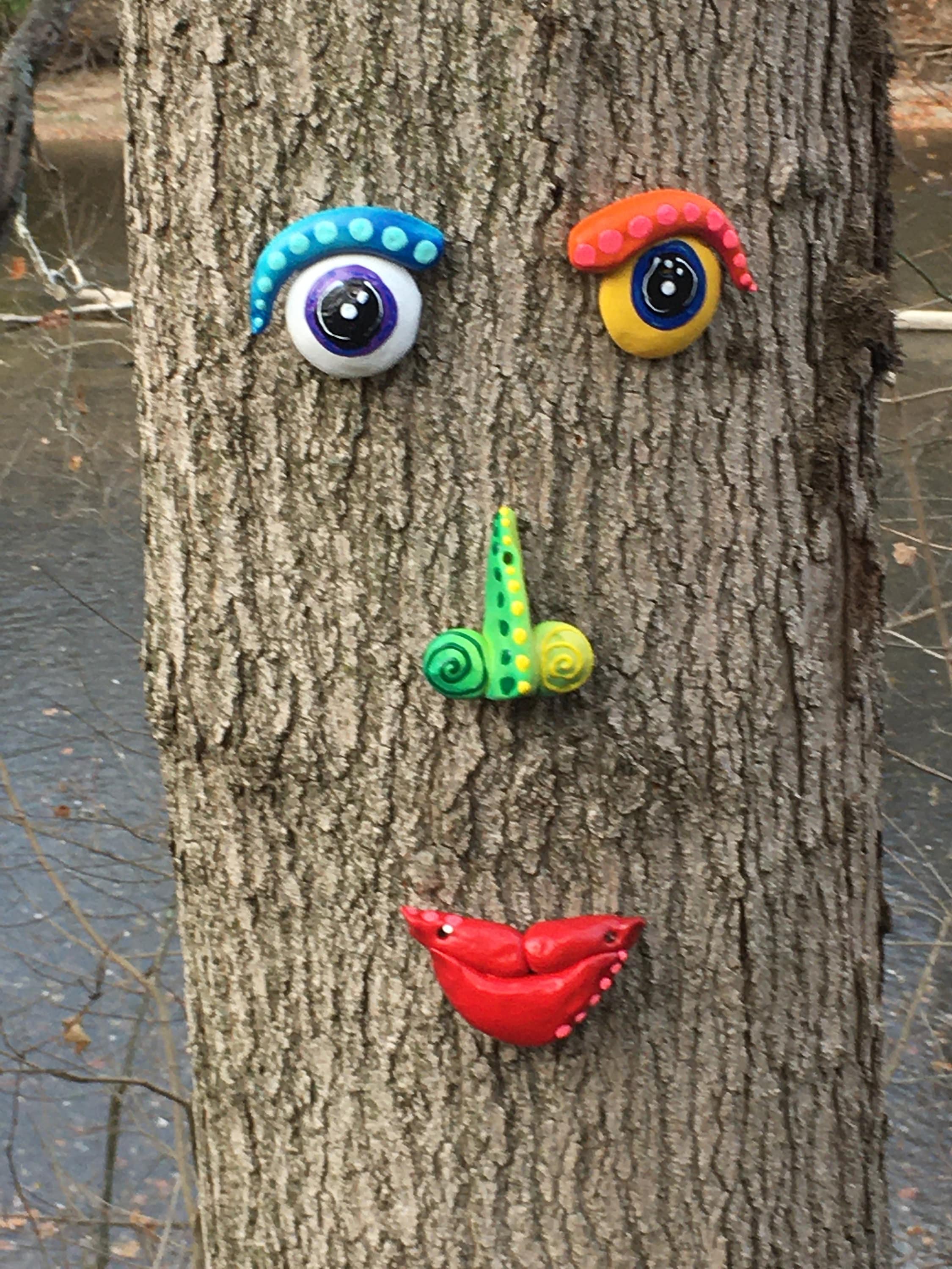 Outdoor tree face decorations