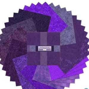 May include: A collection of purple fabric squares arranged in a circular pattern. The squares vary in shades from deep violet to light lavender, with textured and patterned designs. The center features a square with the text "Ancient Royale".