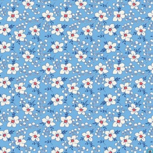 Windham Fabrics Blue background fabric with white flowers. 1940&#39;s reproduction style.