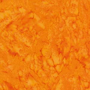 New batiks in the store.  Deep rich colors of,  red, purple, , lime, poppy, and tangerine.