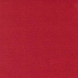 May include: A solid red textured background with a subtle woven pattern.