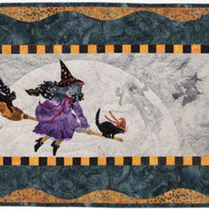 May include: A Halloween-themed table runner featuring a witch riding a broom with a black cat, silhouetted witches, and a full moon. The design is framed by a black and orange checkered border, with a wavy dark teal and orange patterned edge.