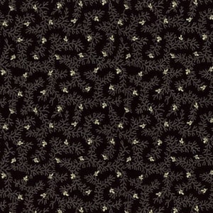 May include: A black fabric with a repeating pattern of small white sprigs and leaves.