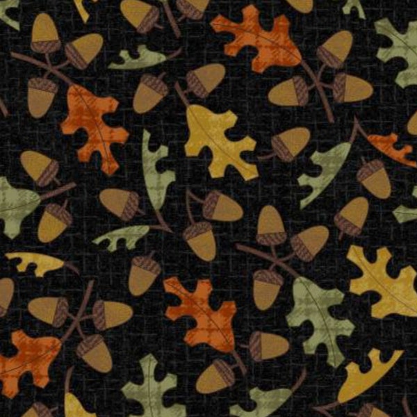 Black flannel with acorns and leaves in oranges and greens. Part of the Autumn Harvest line.