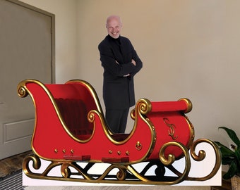 Custom Life Size Cardboard Cutout Sleigh Prop with easel on the back. Folded in thirds for shipping.