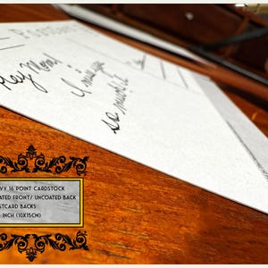 May include: A white postcard with black lines and the text "Hey Mom! I miss you so much!" written in black ink. The postcard is made of heavy 16 point cardstock with a coated front and uncoated back. It measures 4x6 inches (10x15 cm).