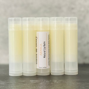 Bulk Arnica Lip Balm Sticks | Clear | Uncolored Chapsticks | Wholesale Sheer Lipsticks w/ Private Label or Unlabeled | Branded Med Spa Gifts