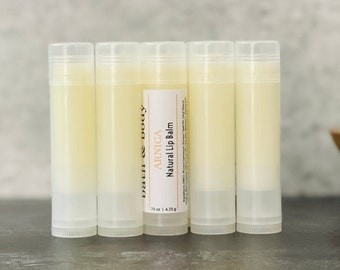 Bulk Arnica Lip Balm Sticks | Clear | Uncolored Chapsticks | Wholesale Sheer Lipsticks w/ Private Label or Unlabeled | Branded Med Spa Gifts