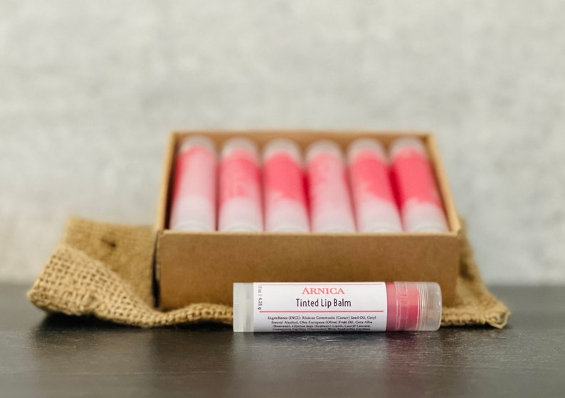 12 Arnica Lip Balm Sticks Clear or Tinted Chapsticks Unlabeled Private Label Med Spa Branded Gifts Pink Brown Red Aesthetics RedTint Arnica Balm