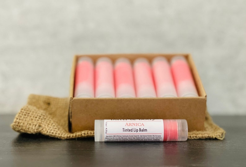 12 Arnica Lip Balm Sticks Clear or Tinted Chapsticks Unlabeled Private Label Med Spa Branded Gifts Pink Brown Red Aesthetics PinkTint Arnica Balm