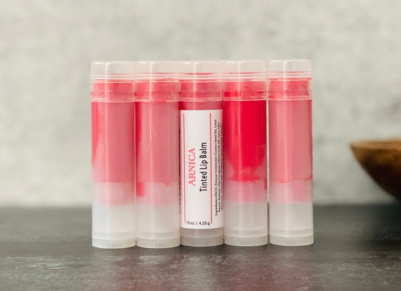 Bulk Red Tinted Arnica Lip Balm Sticks Sheer Strawberry Wholesale Lip Butter w/ Private Label Unlabeled Post Lip Filler Moisturizer image 1