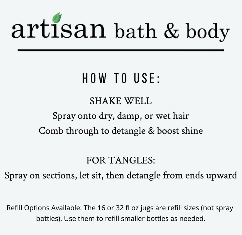 May include: White background with the text "artisan bath & body" in black. Instructions include "Shake well", "Spray onto dry, damp, or wet hair", and "Comb through to detangle & boost shine". Additional text details refill options.