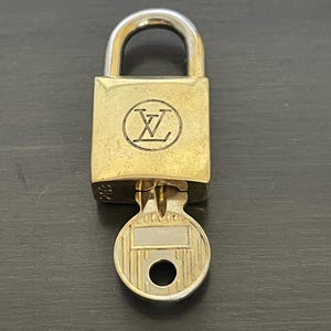 Cadeado especial Louis Vuitton Pinkerly e uma chave nº 203 latão