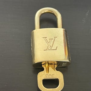 Cadeado especial Louis Vuitton Pinkerly e uma chave nº 303, fechadura de latão nº 11660
