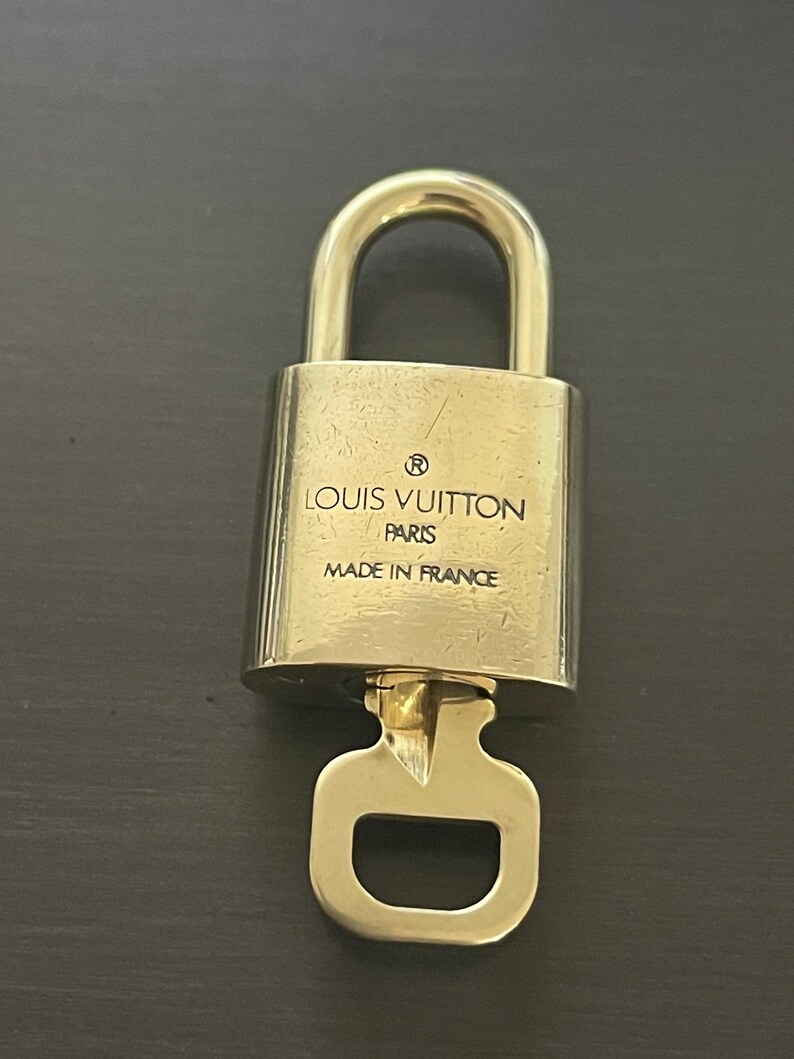 Gioielli da borsa Louis vuitton in metallo Dorato - 23105830