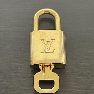 Cadeado especial Louis Vuitton Pinkerly e uma chave nº 321, latão nº 11656