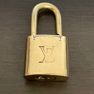 Louis Vuitton Padlock Stock Photo - Download Image Now - Louis